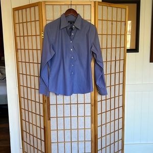 Crisp blue long-sleeved blouse